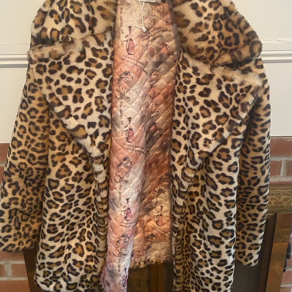 Faux fur coat. NWOT.